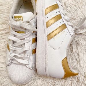 Gold adidas superstars